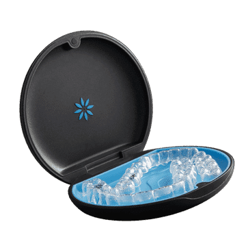 Black dental mirror with blue gel cooling compartment, opened to display ice pack interior.