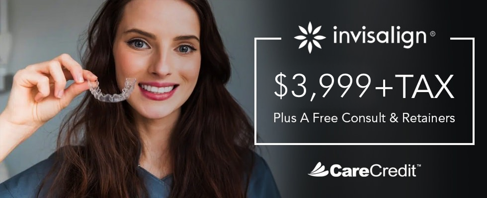 Woman holding Invisalign clear aligner tray with smile, displaying teeth straightening treatment option.
